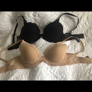 2 Natori Bras 34D one Black and one tan